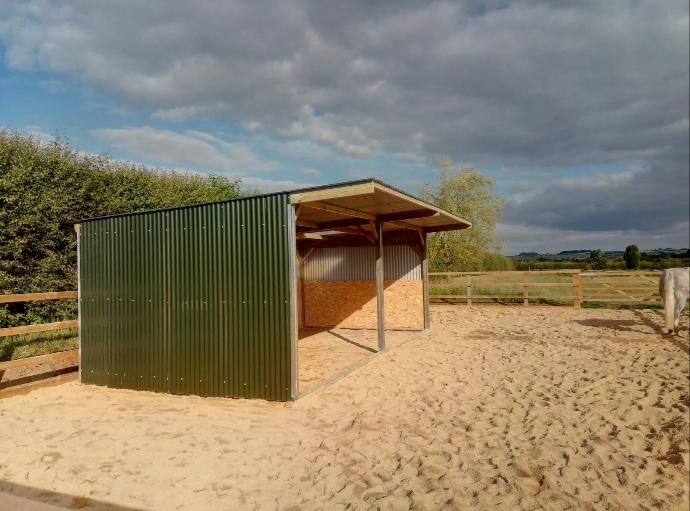 Jelka and Mottaghan Reid horse shelter for all weather turnout